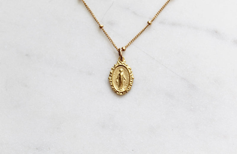 Intricate Miraculous medal necklace