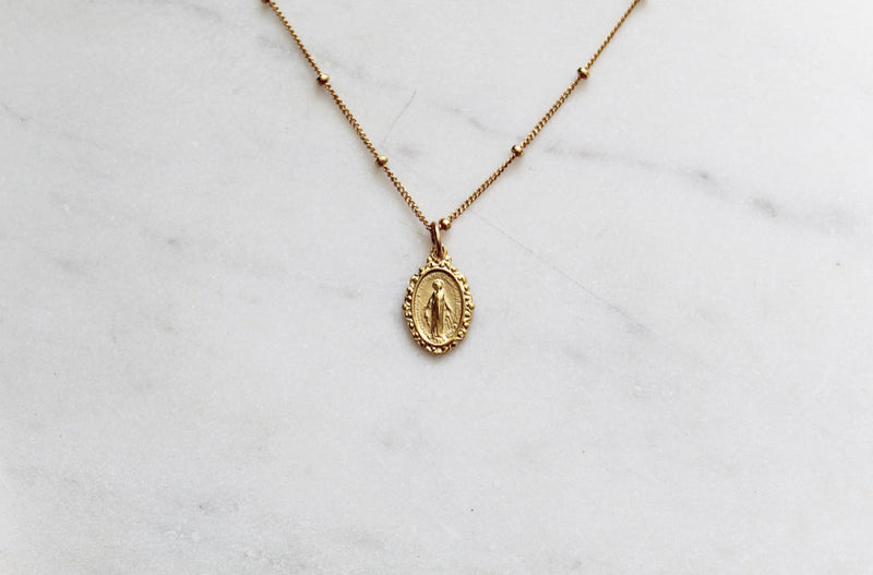 Intricate Miraculous medal necklace