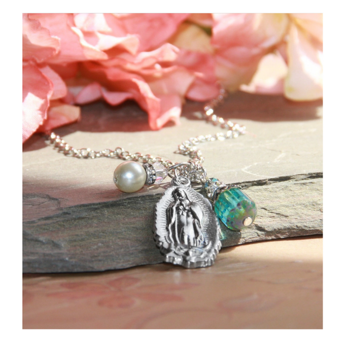 1545 × 2000px  Our Lady of Guadalupe Necklace that features a Teal Crystal Drop and Glass Pearl Charm a perfect Catholic Religious gift to your sister mother family and friends for their birthday Christmas or any occasion
