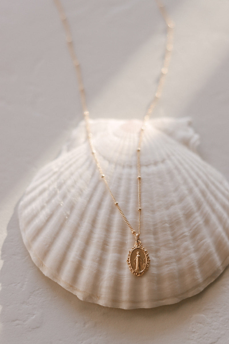 Intricate Miraculous medal necklace