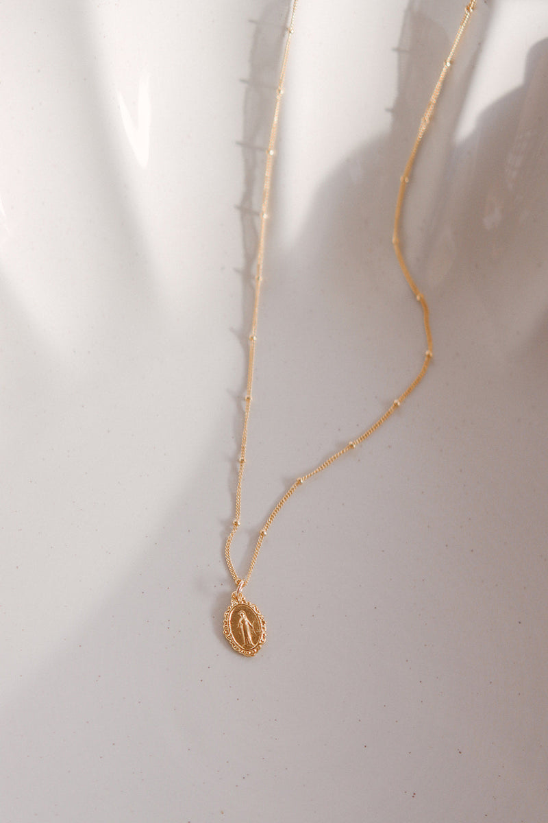 Intricate Miraculous medal necklace