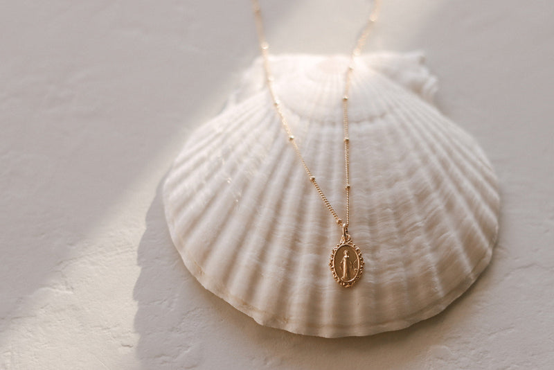 Intricate Miraculous medal necklace