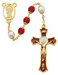 Miraculous Rosary made with double capped red and pears beads and features a miraculous gold plated pewter center and a Holy Mass Crucifix made from red epoxy a perfect collection or a gift to your parents family and friends on any occasion