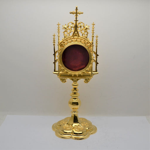Gold Plated Gothic Style Reliquary 13 1/2" tall Gold plated Reliquary with large view window for the largest of relics. Presented in gothic style with a full 24kt. gold-plate.