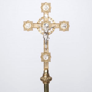 Solid Brass Processional Cross Solid brass Processional cross with Silver plated accents and highlights. Processional cross on smooth brass pole.